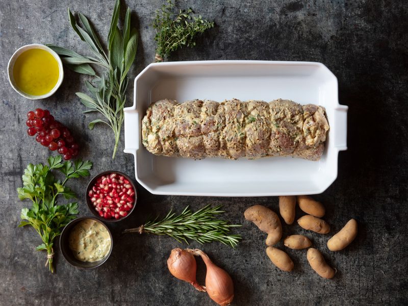 Roast Pork Tenderloin with Grapes, Shallots, Fingerlings, Pomegranate & Herbs