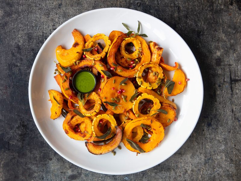 Heirloom Squash Medley with Arugula-Tahini Vinaigrette, Fried Sage, Pomegranate and Pumpkin Seeds