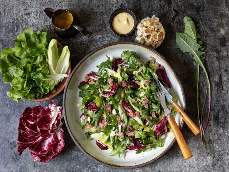 Radicchio & Lettuces with Roasted Garlic Vinaigrette, Pancetta + Blue Cheese